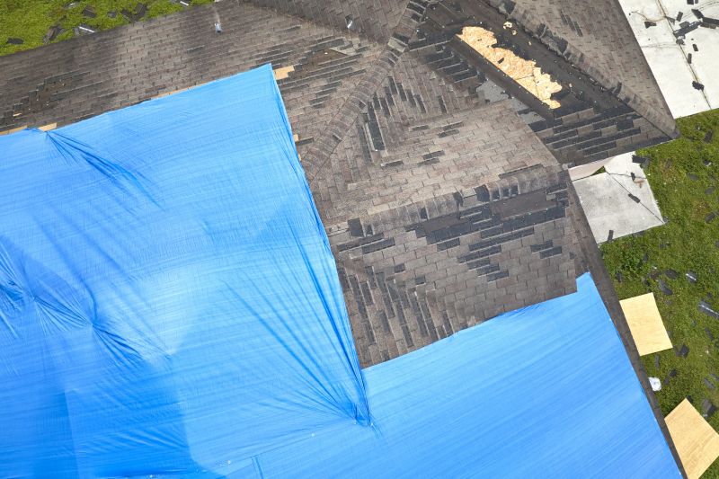 Storm Damage Roof Tarping in Windsor, CO